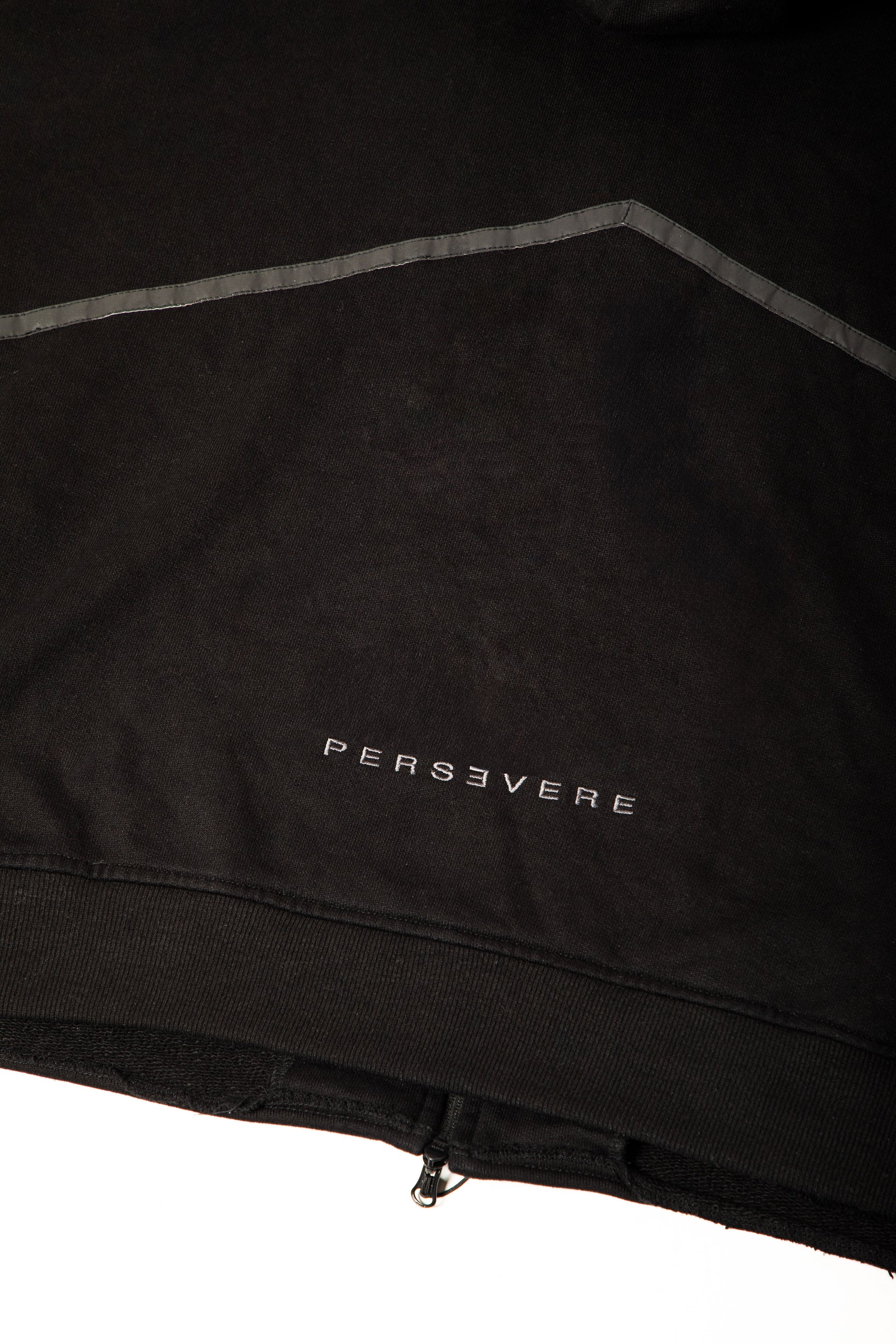 Black jacket with 'PERSEVERE' branding on a white background